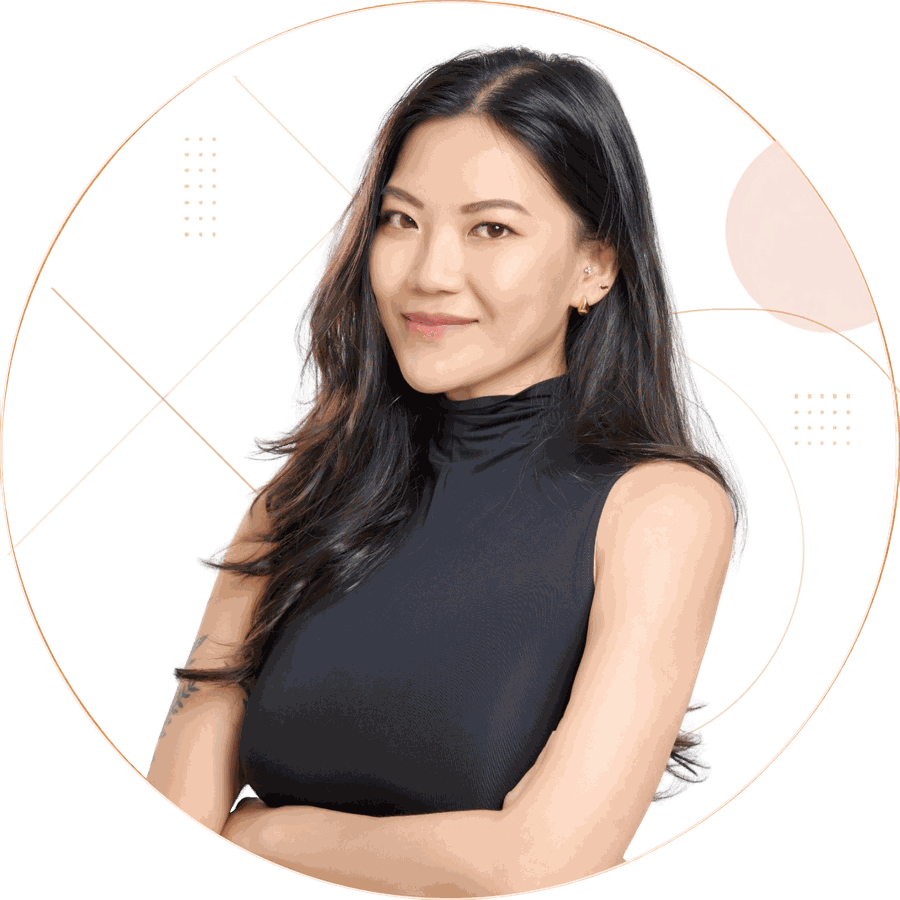 Nicole Chin speaking with a microphone on a panel